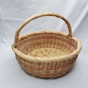 Vintage Tan and Pink Circular Woven Wicker Basket With Handle
